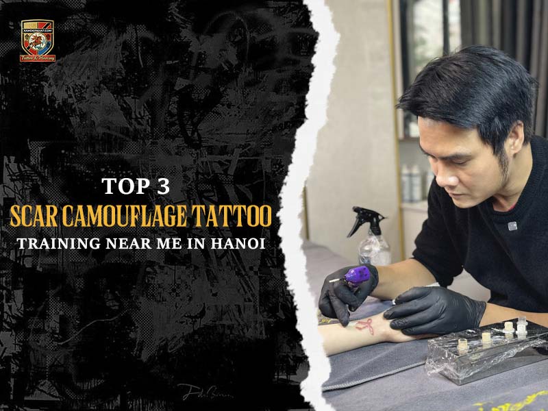 Male instructor demonstrating techniques for scar camouflage tattoo training near me in Hanoi on a client's arm.