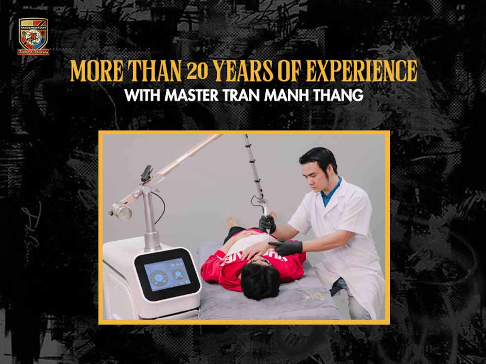 Master Tran Manh Thang performing precision skin camouflage tattoo in Hanoi with over 20 years of experience